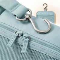 Close-up of swivel hook and mesh pocket zippers 4K