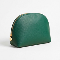 Emerald dome cosmetic pouch closed on white background 4K